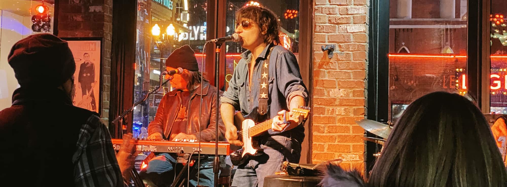 bar singer on guitar in Billings